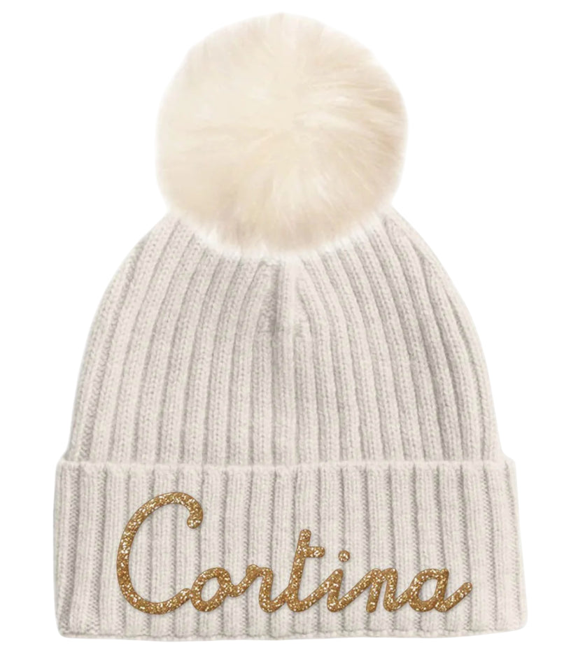 xMC2 SAINT BARTH BERRETTO IN MAGLIA CON POMPON E SCRITTA CORTINA LUREX BIANCO PANNA